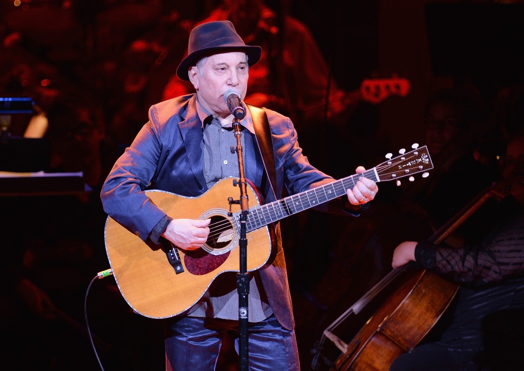 NEW YORK, NY - APRIL 17:  Paul Simon performs during the 25th Anniversary Rainforest Fund Benefit Concert at Carnegie Hall on April 17, 2014 in New York City.  (Photo by Jamie McCarthy/Getty Images)